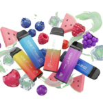Vibrant 3D render of a collection of IGET vape devices and e-liquid bottles, surrounded by fresh fruit (grape, strawberry, watermelon) representing the top flavors.